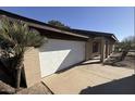 Attached garage with an automatic door opener at 14017 N 40Th Ave, Phoenix, AZ 85053