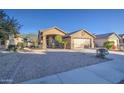 House exterior with landscaped front yard at 1633 S 171St Dr, Goodyear, AZ 85338