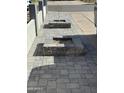 Landscaped walkway leading to the front entrance with decorative planters at 1922 N 25Th St, Phoenix, AZ 85008