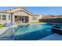 Stunning pool with a clean design, perfect for relaxation and entertainment at 21097 E Sparrow Dr, Queen Creek, AZ 85142