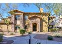 Well-maintained townhome featuring stone accents and a welcoming entrance at 21320 N 56Th St # 1175, Phoenix, AZ 85054