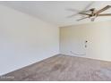 Generous sized bedroom with ceiling fan and carpeted floors at 2228 E Campbell E Ave # 234, Phoenix, AZ 85016