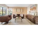 Cozy living room featuring leather furniture and wood accents at 310 N 65Th St # 9, Mesa, AZ 85205