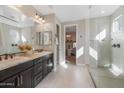 Spa-like bathroom with double sinks, a large shower, and modern fixtures at 4552 S Flare --, Mesa, AZ 85212