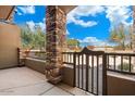 Private patio with gate access to a landscaped area at 5350 E Deer Valley E Dr # 1279, Phoenix, AZ 85054