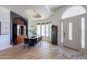 Formal dining room with a large wood table and built-in hutch at 922 E Desert Hills Estate Dr, Phoenix, AZ 85086