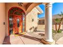 Elegant front entrance with a wood door and welcoming mat at 928 E Valencia Dr, Phoenix, AZ 85042