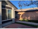 Side yard with walkway leading to the back of the home at 10138 W Highland Ave, Phoenix, AZ 85037