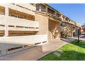 Apartment building exterior with walkway and landscaping at 1331 W Baseline Rd # 251, Mesa, AZ 85202