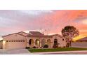 Stunning desert landscape sunset view of this beautiful home at 21503 E Saddle Ct, Queen Creek, AZ 85142