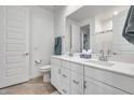 Modern bathroom with double vanity, a toilet, and shower at 2156 W Sierra Sunset Trl, Phoenix, AZ 85085