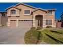 Two-story house with a large driveway and landscaping at 2734 E Birchwood Pl, Chandler, AZ 85249