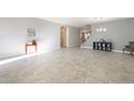 Spacious living room with tile floors and large windows at 2734 E Birchwood Pl, Chandler, AZ 85249