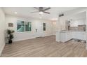 Bright living room featuring wood-look tile flooring and a ceiling fan at 4268 N 81St St, Scottsdale, AZ 85251