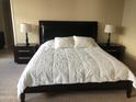 Bright bedroom with a comfortable bed and nightstands at 4808 N 24Th St # 824, Phoenix, AZ 85016
