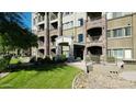 Exterior view of an apartment building with landscaping at 5450 E Deer Valley Dr # 1004, Phoenix, AZ 85054