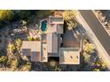 Aerial view of house, pool, and surrounding landscape at 14597 E Corrine Dr, Scottsdale, AZ 85259