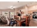 Dining area with wood table and chairs near the kitchen at 14749 N 153Rd Dr, Surprise, AZ 85379