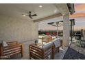 Relaxing covered patio with outdoor furniture and mountain views at 25536 S 230Th St, Queen Creek, AZ 85142