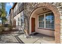 Inviting front entrance with stonework and wrought iron accents at 2757 S Pewter Dr # 103, Gilbert, AZ 85295