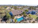 Stunning aerial view of private backyard oasis with sparkling pool and lush landscaping at 28602 N 58Th St, Cave Creek, AZ 85331