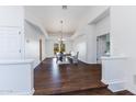 Elegant dining room with hardwood floors and chandelier at 28602 N 58Th St, Cave Creek, AZ 85331