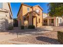 Two-story house with front yard and walkway at 2875 S Key Biscayne Dr, Gilbert, AZ 85295