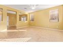 Bright living room with tile floors and neutral walls at 2875 S Key Biscayne Dr, Gilbert, AZ 85295