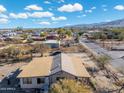 Aerial view of a house, showing its size and location relative to the surrounding area at 3204 W Mcneil St, Laveen, AZ 85339