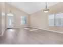 Bright and spacious living room with hardwood floors at 3482 W Mineral Butte Dr, San Tan Valley, AZ 85144