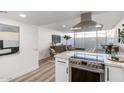 Open concept kitchen features stainless steel appliances and island at 4411 N 40Th St # 52, Phoenix, AZ 85018