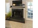 Modern fireplace with a sleek black tile surround at 5505 E Mclellan Rd # 99, Mesa, AZ 85205