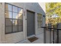 Condo building entry with private door at 8020 E Thomas Rd # 330, Scottsdale, AZ 85251