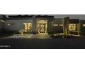 Modern entry with water feature & dark brick accents at 10784 E Pinnacle Peak Rd, Scottsdale, AZ 85255