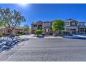 Two story house on a residential street with landscaping at 23116 N 41St St, Phoenix, AZ 85050