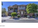 Two-story house with solar panels and landscaped yard at 23116 N 41St St, Phoenix, AZ 85050
