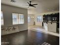 Open kitchen features dark cabinets and an island at 4072 S Skyline Ct, Gilbert, AZ 85297