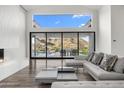 Spacious living room with fireplace and mountain views at 4129 E Sandy Mountain Rd, Paradise Valley, AZ 85253