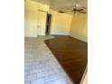 Spacious living area featuring dark hardwood floors at 5019 W Roma Ave, Phoenix, AZ 85031