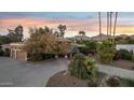 Luxury home with a large yard and mountain views at 10190 E Sunnyside Dr, Scottsdale, AZ 85260