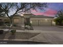 Beautiful one-story home with two car garage and mature landscaping at 2611 W Trapanotto Rd, Phoenix, AZ 85086