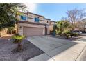 Two story home with attached garage and landscaping at 45707 W Barbara Ln, Maricopa, AZ 85139
