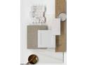 A curated interior design color palette featuring marble, quartz, wood and neutral tones creates a harmonious look at 4807 N 177Th Ln, Goodyear, AZ 85395