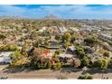 Aerial view of property with mountain views and surrounding neighborhood at 5131 N 18Th St, Phoenix, AZ 85016