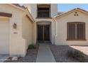 Home's entrance with double doors and a walkway at 8912 S 40Th Dr, Laveen, AZ 85339