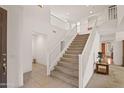 Grand staircase leading to the second floor at 8912 S 40Th Dr, Laveen, AZ 85339