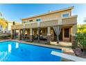 Spacious pool with covered patio and lounge area at 21932 S 185Th Way, Queen Creek, AZ 85142