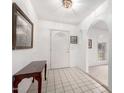 Bright and spacious entryway with tile flooring and a console table at 460 S Sunnyvale --, Mesa, AZ 85206