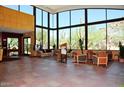 Bright community clubhouse lobby with seating and desert views at 7287 E Sunset Sky Cir, Scottsdale, AZ 85266