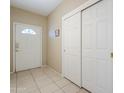 Interior entryway with tile flooring and double door closet at 11360 E Keats Ave # 78, Mesa, AZ 85209